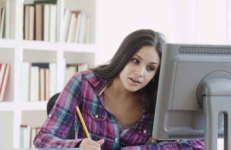 photo of women doing a resume.