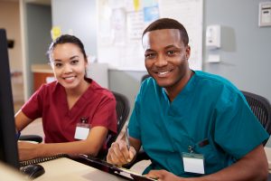 male nurse at work station