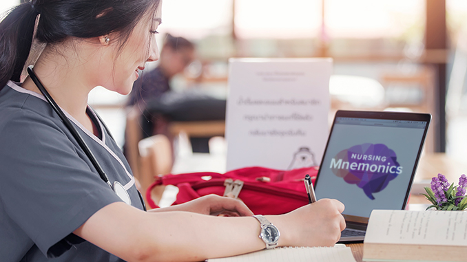 nursing student studying mnemonics on laptop