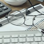 eyeglasses on a keyboard