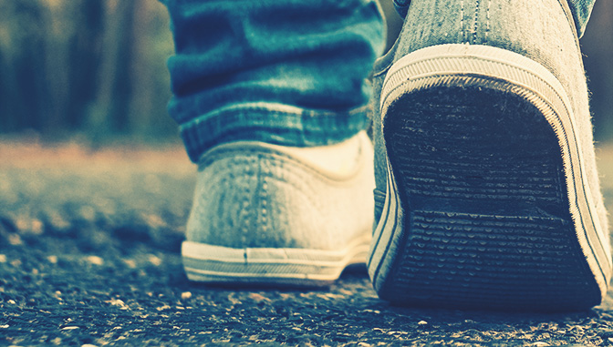 close up of sneakers while walking