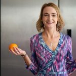 Carmen Roberts, dietician, standing in a kitchen