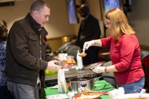 excelsior employees tasting chili 