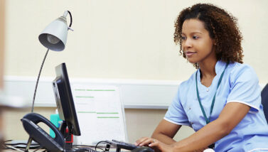 Nurse working on computer