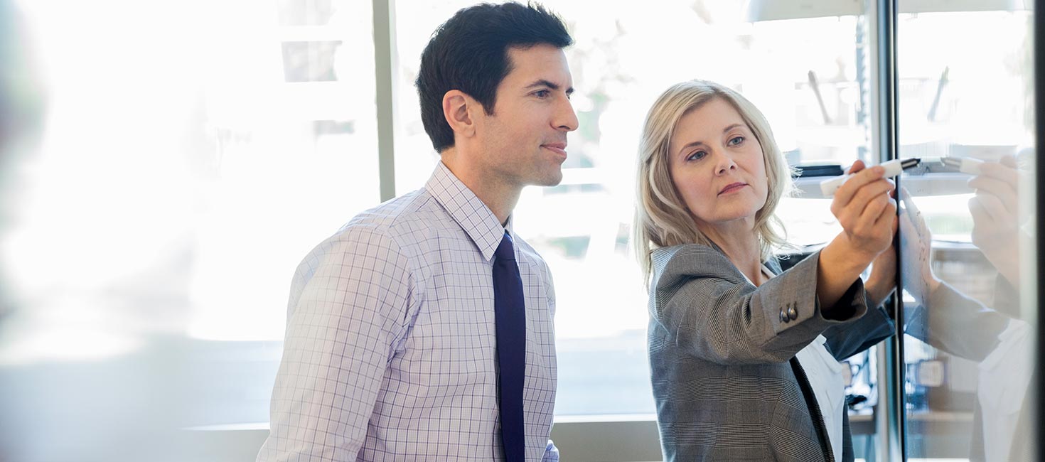 Business executives working in an ideation session