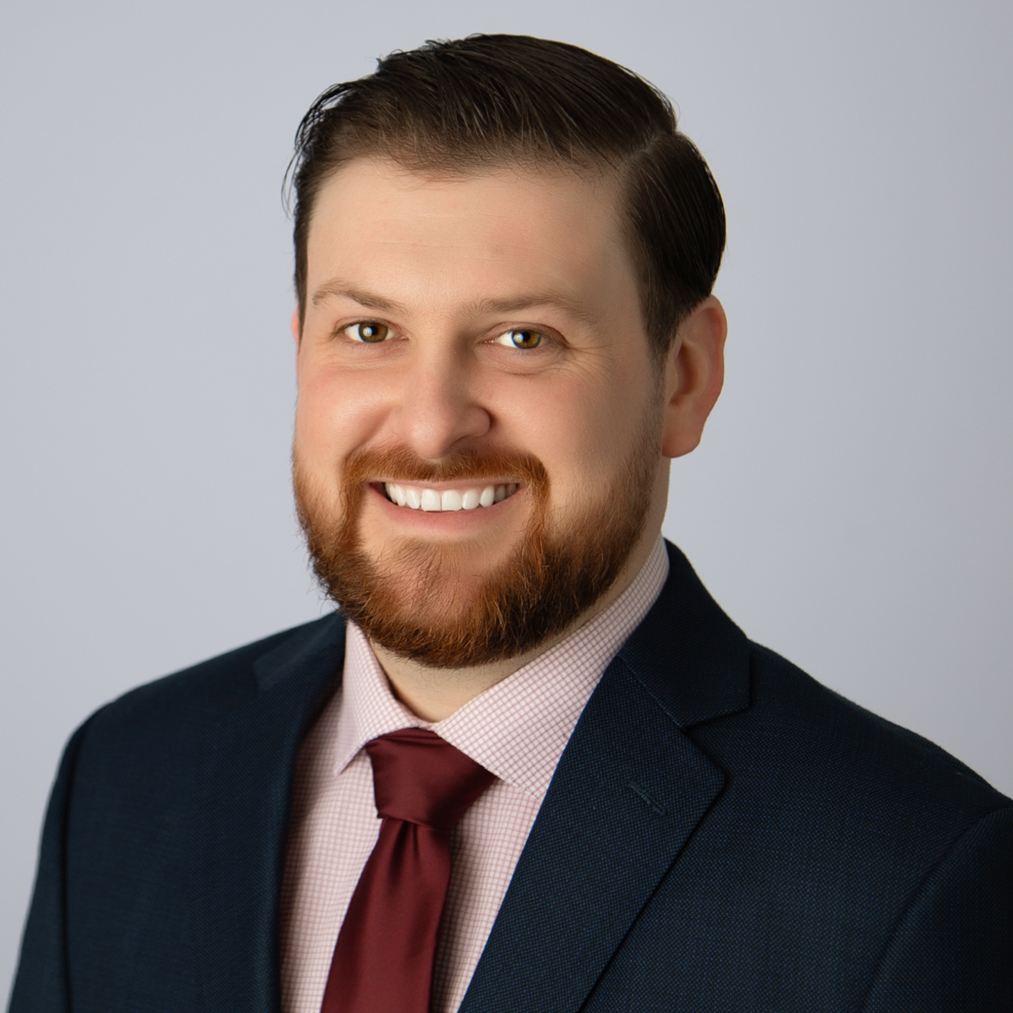 micah white , headshot of white man in suit smiling at camera