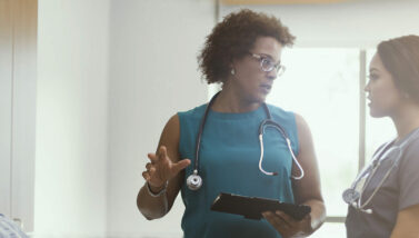 Head nurse speaking to a team