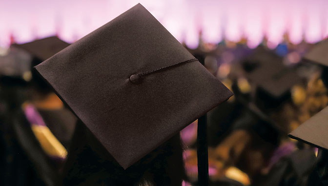 Graduate at commencement