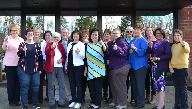 excelsior employees with more than thirty years longevity give thumbs up