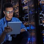 Man in server room, it and cyber roles