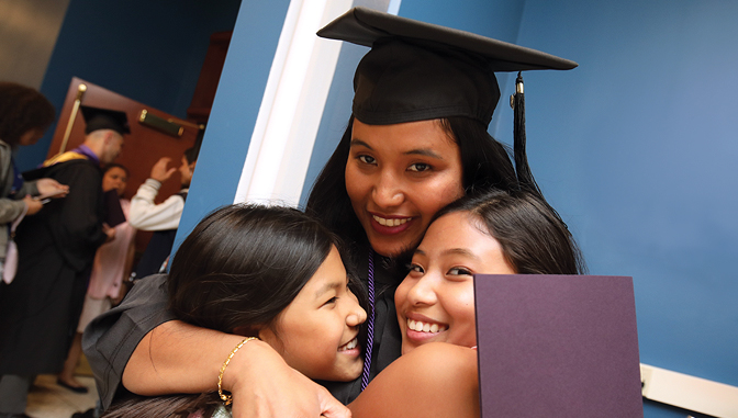 Graduate with daughters