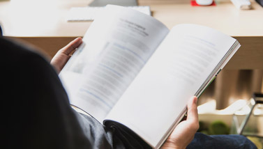 Person reading journal