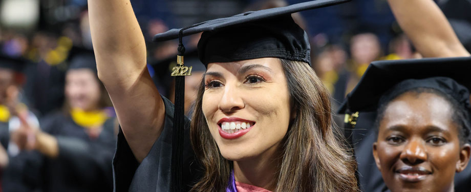 smiling female graduate at commencement