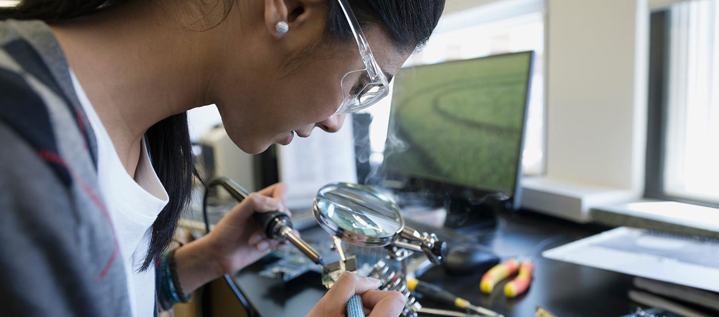 Electrical engineer working on a prototype