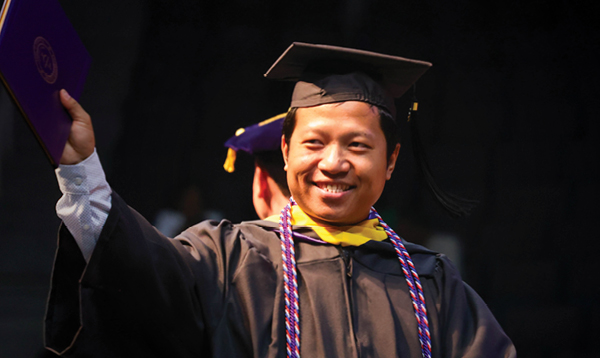 Excelsior University student at commencement