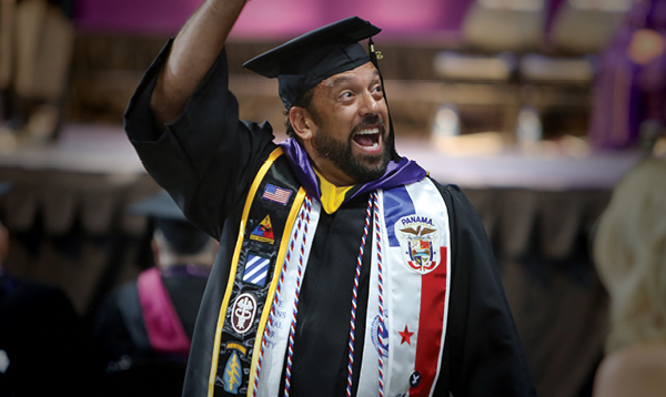 Excelsior University student at commencement