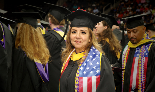 Excelsior University student at commencement