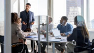 group of business leaders in conference room