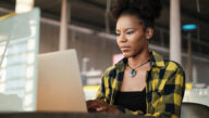 adult women studying on laptop