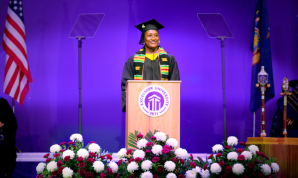 Sena Amegbletor speaking at the Excelsior University 2024 Commencement