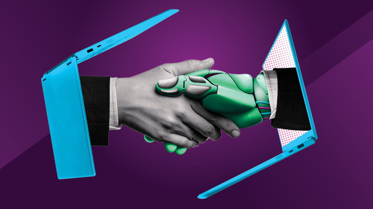 Human hand shaking a robot hand