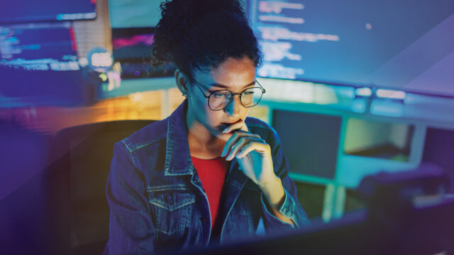Cybersecurity analyst at computer
