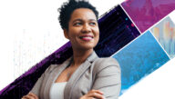 Smiling businesswoman with arms folded