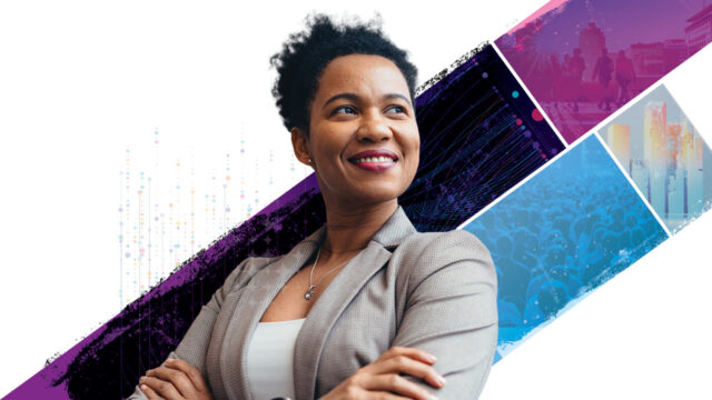 Smiling businesswoman with arms folded
