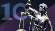 Statue of blindfolded Lady Justice holding up her scales