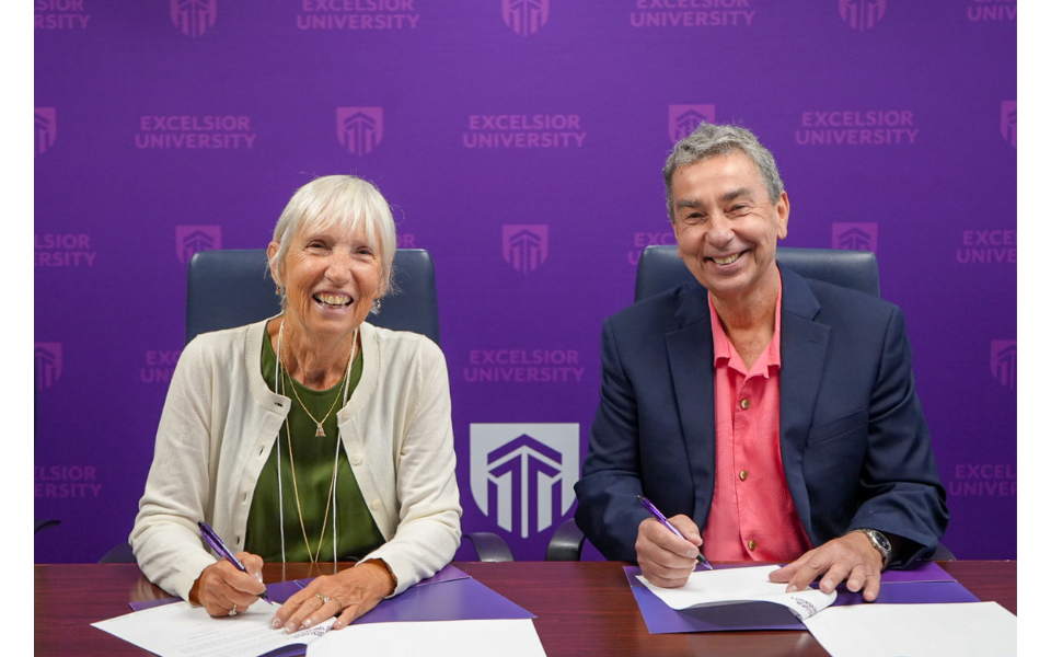 President of the Julia O. Wells Memorial Education Foundation, Inc. Board of Directors Kathleen Bagley Santarcengelo and Excelsior University President David Schejbal sign the gift agreement securing $300,000 in funds from the Foundation to establish an endowment at Excelsior to support nursing student scholarships.